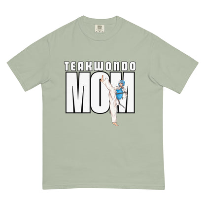 “Taekwondo MOM unisex heavyweight t-shirt in blossom, a soft pastel pink that adds a warm and cheerful look.”
